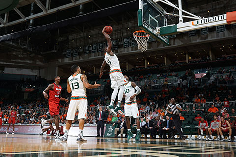 Men's Basketball Player Dunking