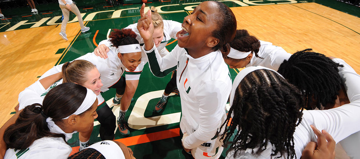 Women's Basketball Team in Huddle