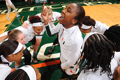 Women's Basketball Team in Huddle